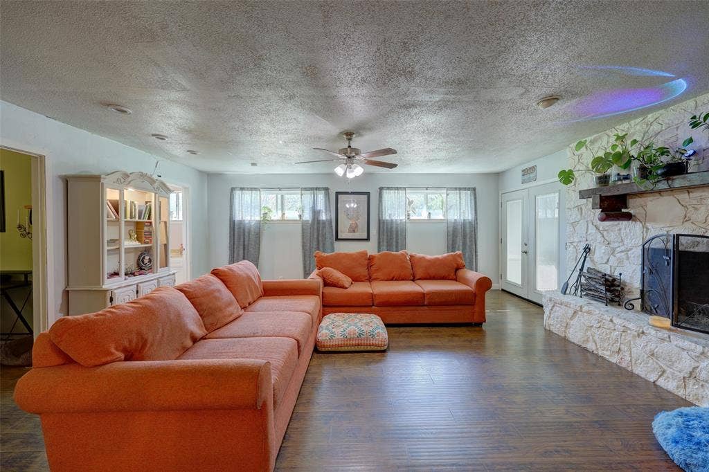 901 Elizabeth Boulevard, Granbury, TX 76048 Grand living space - large enough for two large sofas with room to spare