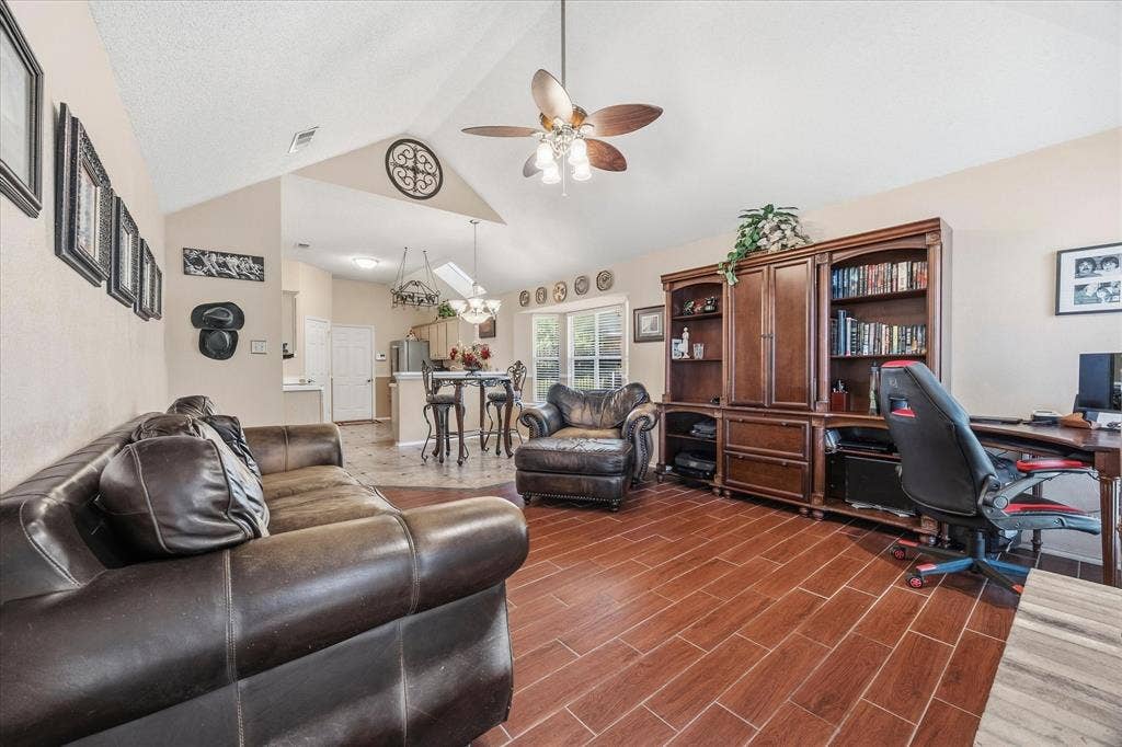 6412 Bluebonnet Drive, Rowlett, TX 75089 Open floor plan features family room opening onto breakfast area and kitchen