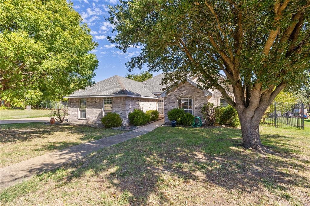 6412 Bluebonnet Drive, Rowlett, TX 75089 Mature trees are a plus!