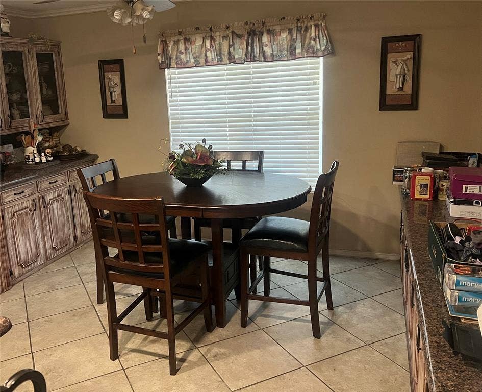2612 Quail Run Drive, Plano, TX 75075 Large dining area at one end of kithcen. Tons of storage
