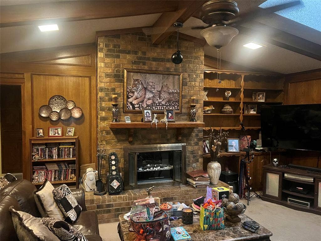 2612 Quail Run Drive, Plano, TX 75075 Built ins surround the fireplace.