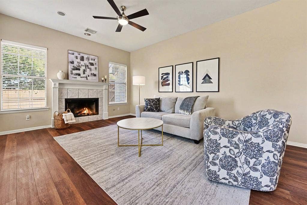 401 Stonebridge Circle, Allen, TX 75013 Den with fireplace and ceiling fan
