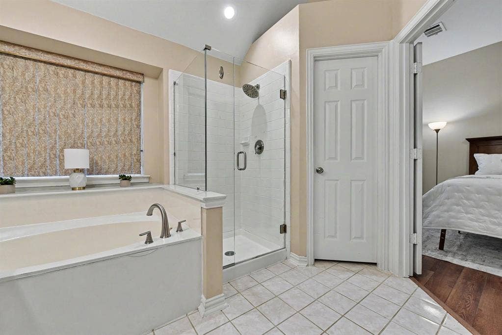 401 Stonebridge Circle, Allen, TX 75013 Primary bath with garden tub and walk-in shower
