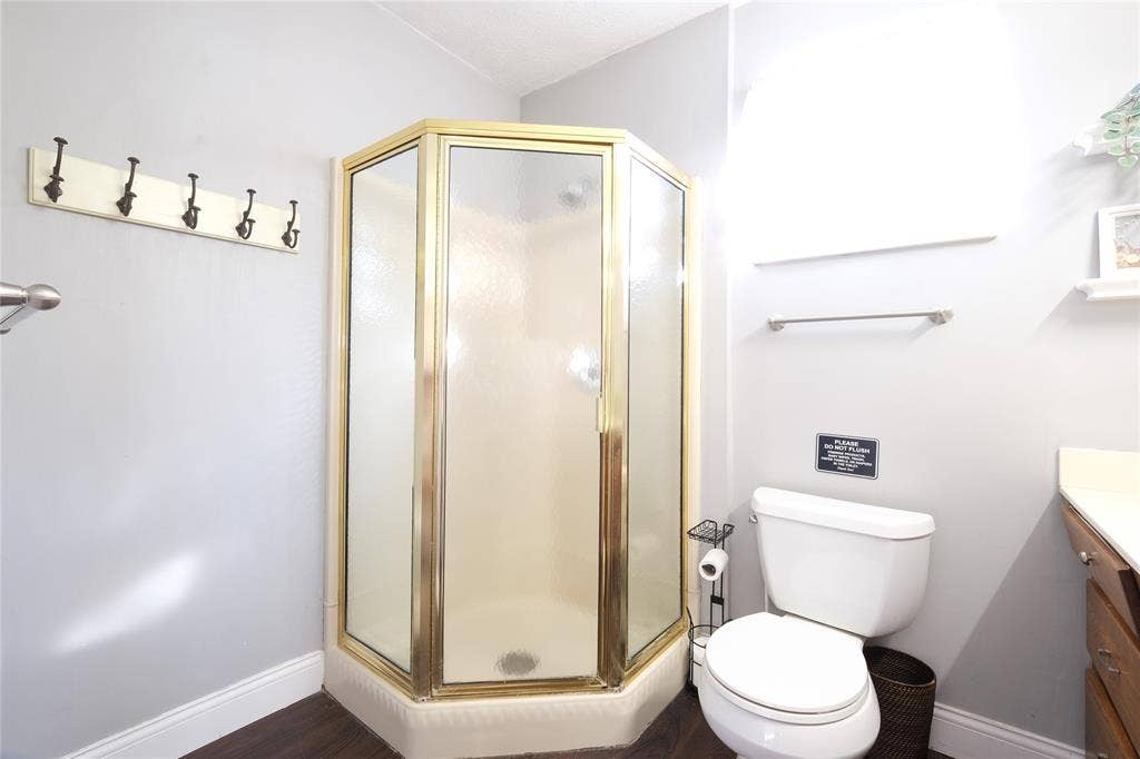 514 E Spring Valley Road, Richardson, TX 75081 Stand in shower with hooks for towels or robes