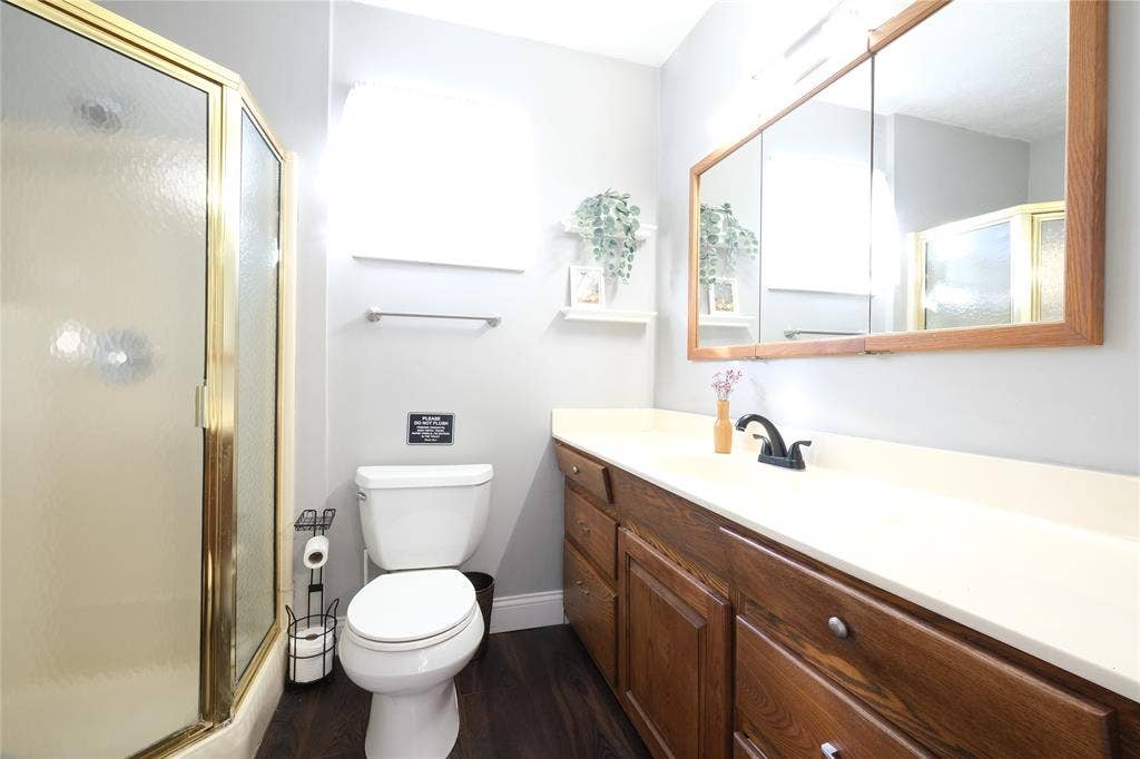 514 E Spring Valley Road, Richardson, TX 75081 View of bathroom with vanity and shower