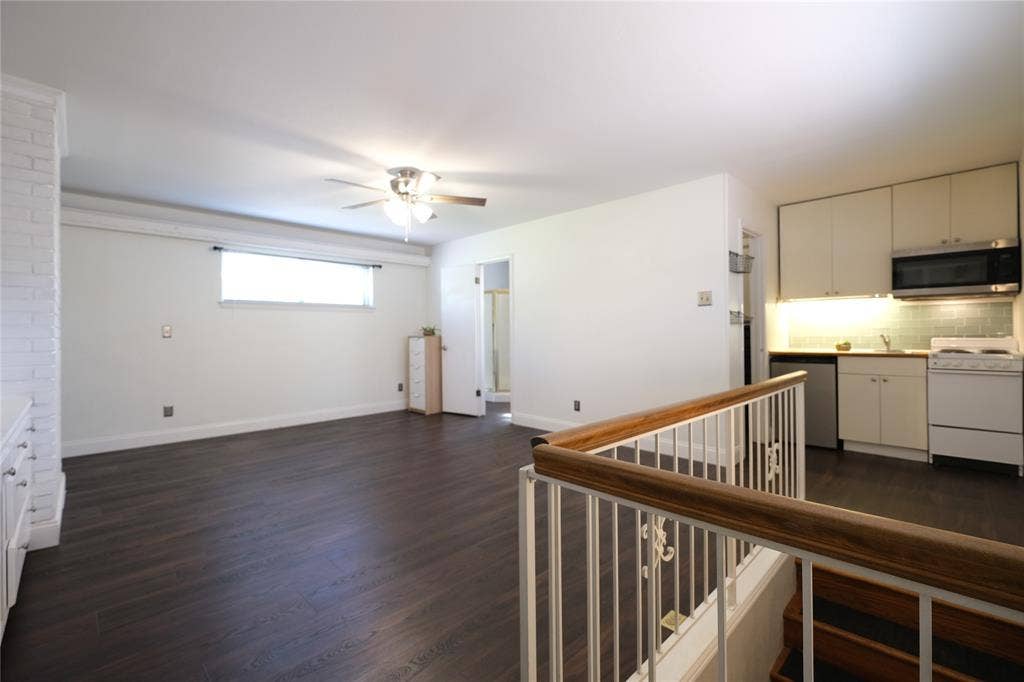 514 E Spring Valley Road, Richardson, TX 75081 View of living area, with views into kitchen, bathroom, and walk-in closet