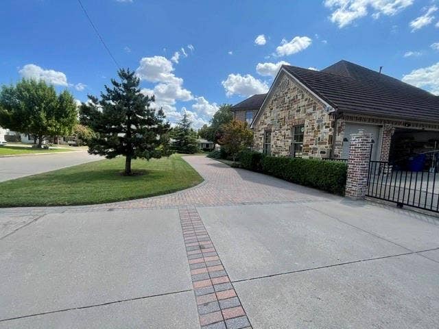 12629 Epps Field Road, Farmers Branch, TX 75234 Circular driveway and gated driveway to garage