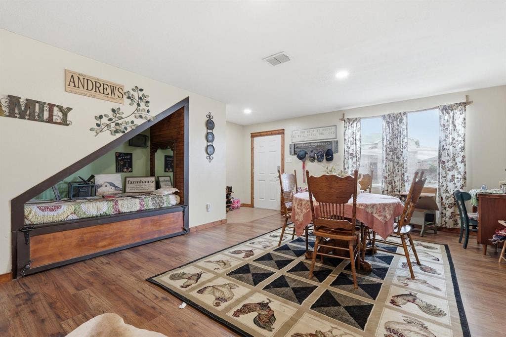 1633 Sierra Meadow Lane, Fort Worth, TX 76247 Built-in wooden alcove with angled frame, wood-finish flooring, recessed lighting, and large windows