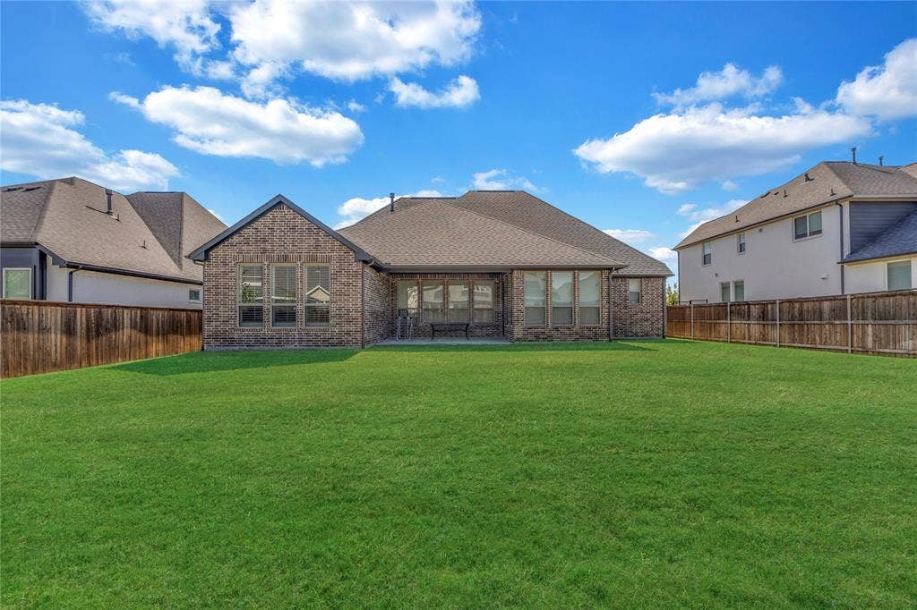 2971 Gaulding Drive, Prosper, TX 75078 Full brick exterior, expansive fenced backyard, and a composition shingle roof