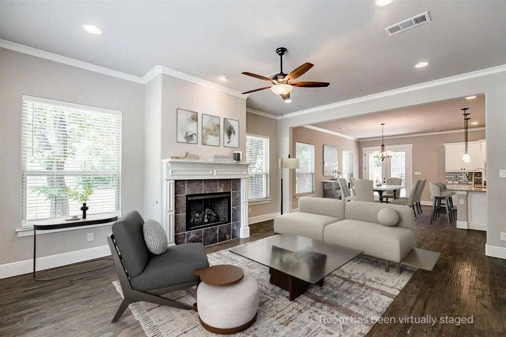 336 Kaye Street, Coppell, TX 75019 Living area featuring wood-finish flooring, recessed lighting, crown molding, a ceiling fan, and a tile-surround fireplace with a mantel