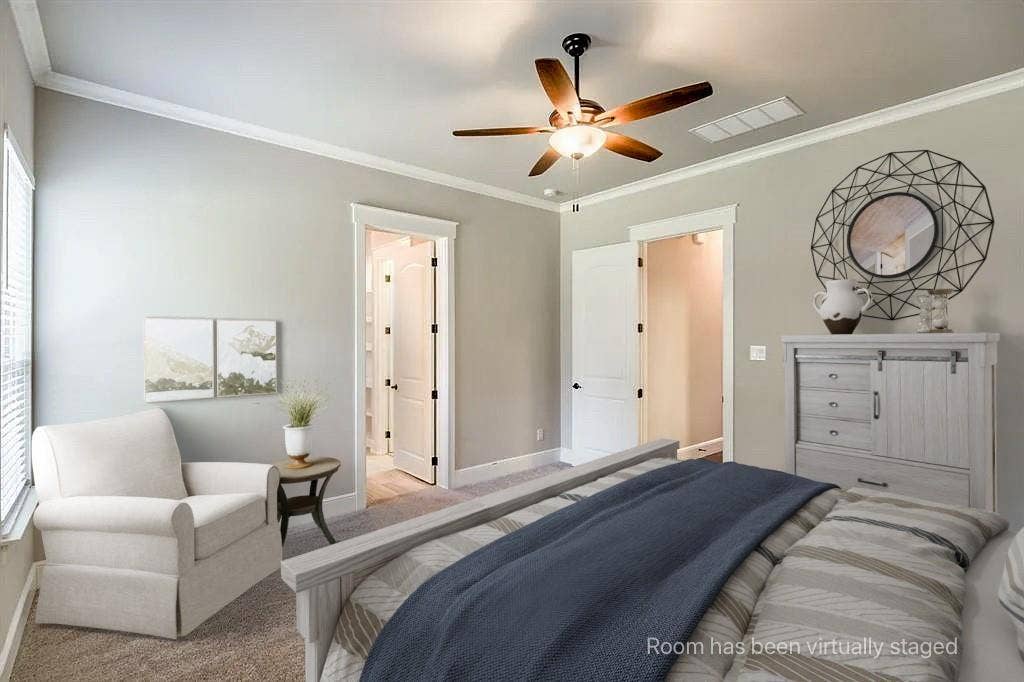 336 Kaye Street, Coppell, TX 75019 Neutral-toned walls featuring crown molding, carpeting, and a central ceiling fan with integrated light fixture