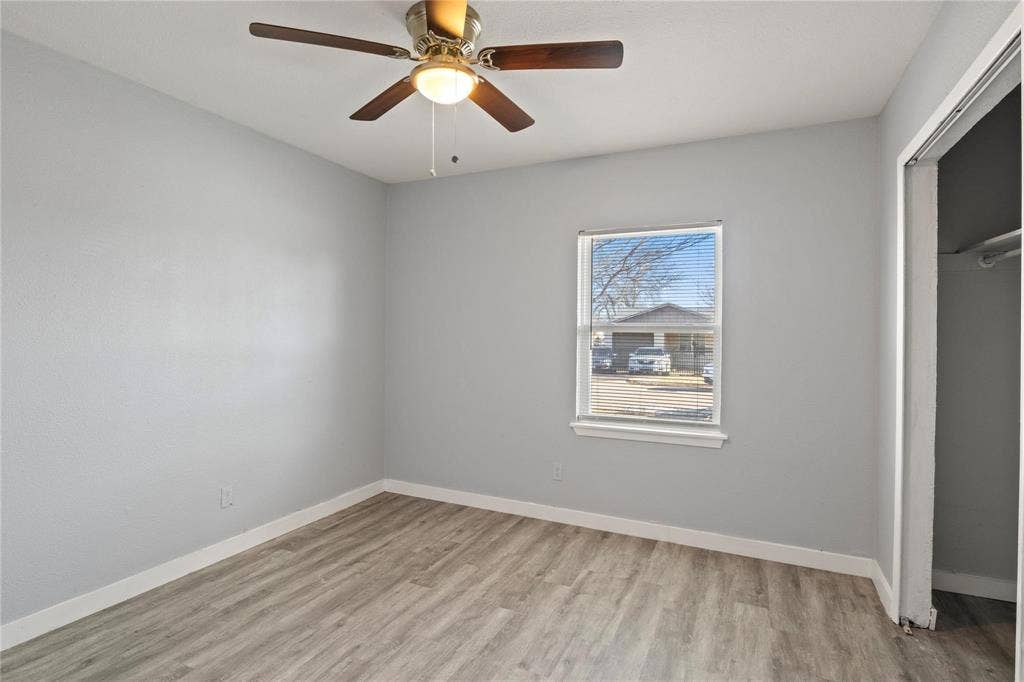 6543 Gentle River, Dallas, TX 75241 Wood-finish flooring, neutral wall tones, multi-blade ceiling fan with integrated lighting