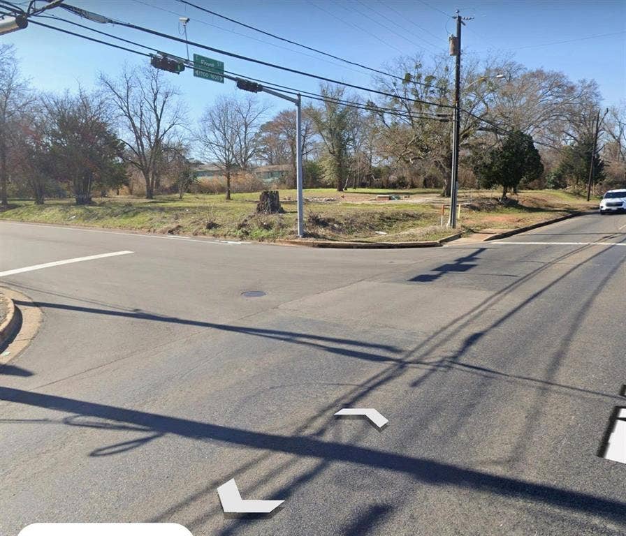 1621 E Front Street, Tyler, TX 75702 Corner lot featuring open green space and mature trees