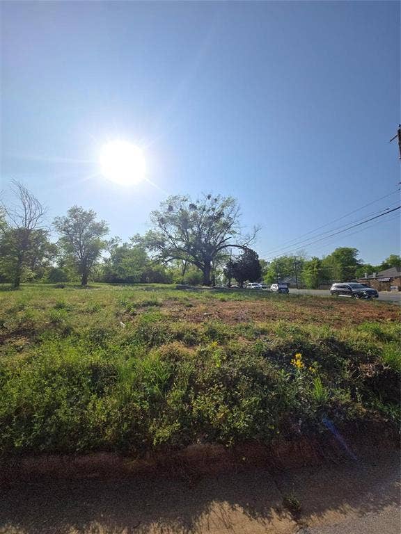 1621 E Front Street, Tyler, TX 75702 Vacant lot featuring cleared terrain, native ground cover, and mature trees