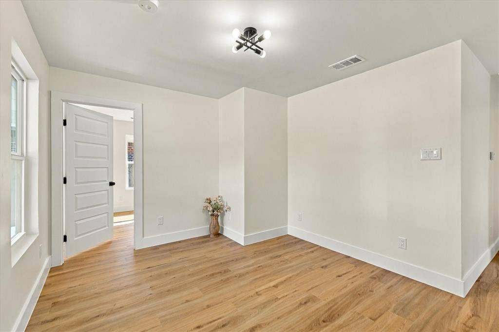 Flex space large enough for an office with access to a secondary bedroom.