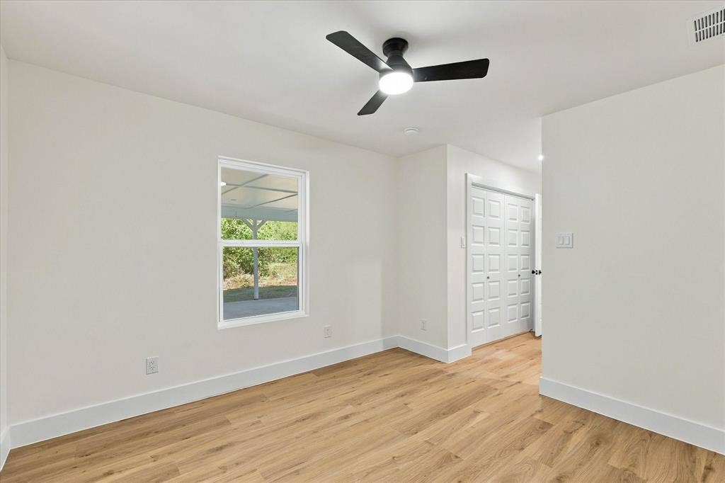 Primary bedroom with brand new closet.