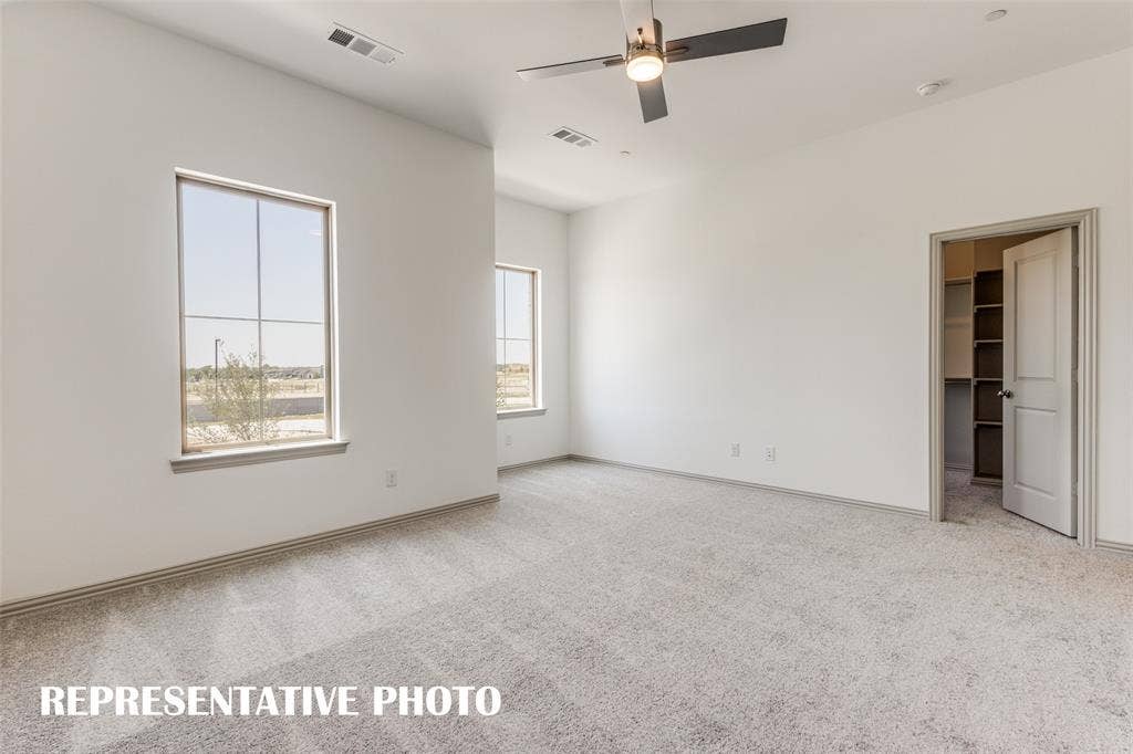 4759 Lunker Street, McKinney, TX 75071 Oversized windows, a large walk in closet and reading nook are just a few of the designer touches found in this fantastic owner's suite. REPRESENTATIVE PHOTO.
