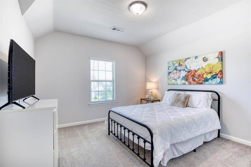 Upstairs bedroom with closet.