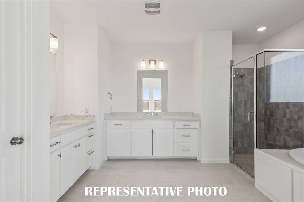 5601 Roselyn Way, McKinney, TX 75070 This owner's bath was designed with ample space for two! REPRESENTATIVE PHOTO