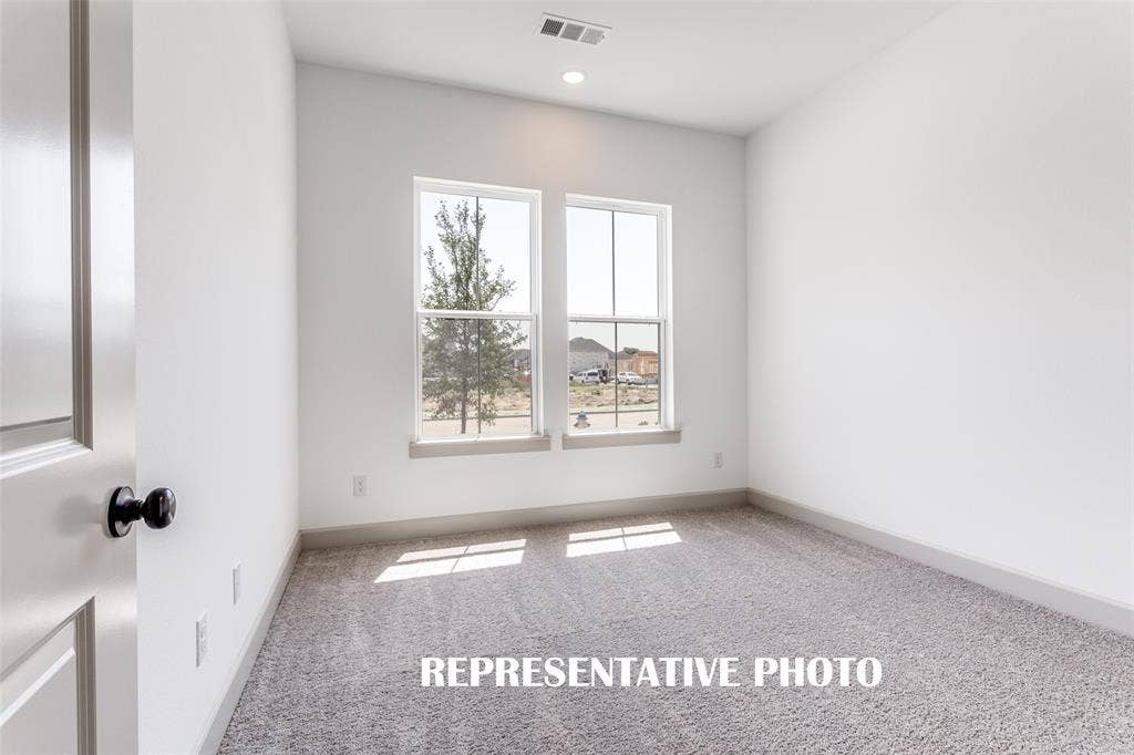 1405 Mistflower Lane, Celina, TX 75009 You'll find nicely sized secondary bedrooms in our Toulouse floor plan. REPRESENTATIVE PHOTO