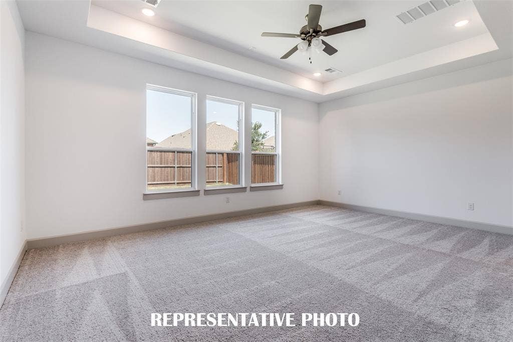 1405 Mistflower Lane, Celina, TX 75009 The peaceful owner's suite is located at the back of the home for additional privacy. REPRESENTATIVE PHOTO
