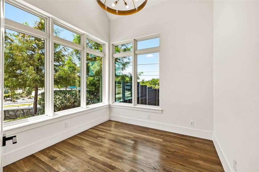 1222 Whisper Rock Drive, Rockwall, TX 75032 Vaulted ceiling, chandelier and massive windows
