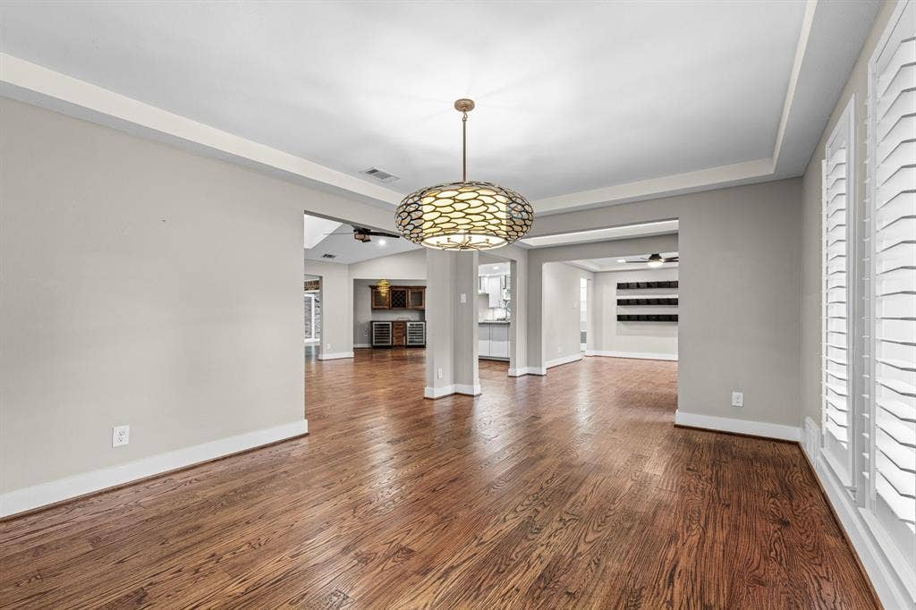 9656 Ravensway Drive, Dallas, TX 75238 From the dining room looking into the main part of the home