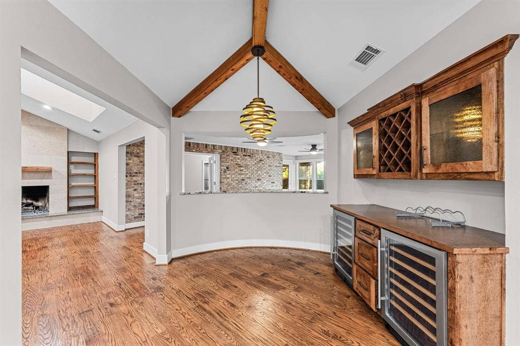 9656 Ravensway Drive, Dallas, TX 75238 Breakfast room includes a dry bar area with 2 wine fridges.