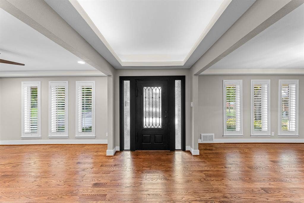 9656 Ravensway Drive, Dallas, TX 75238 Entryway featuring a coffered ceiling