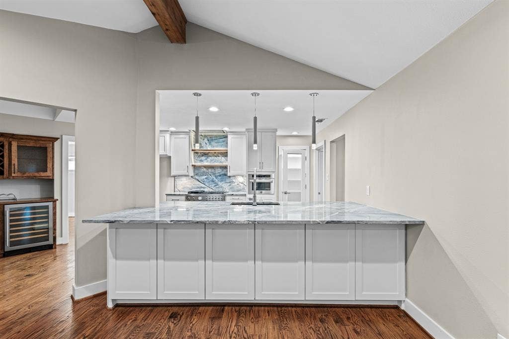 9656 Ravensway Drive, Dallas, TX 75238 Looking into the kitchen, notice the abundant storage