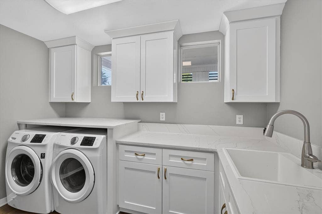4420 Hollow Oak Drive, Dallas, TX 75287 Laundry downstairs off kitchen.