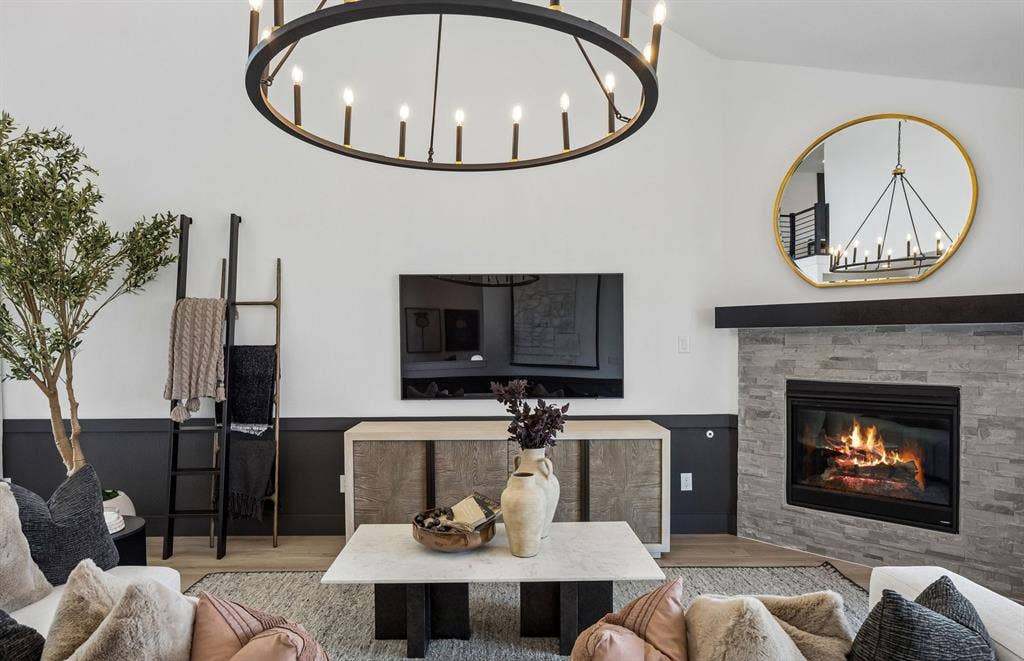 *Model Representation - Spacious gathering room with large windows