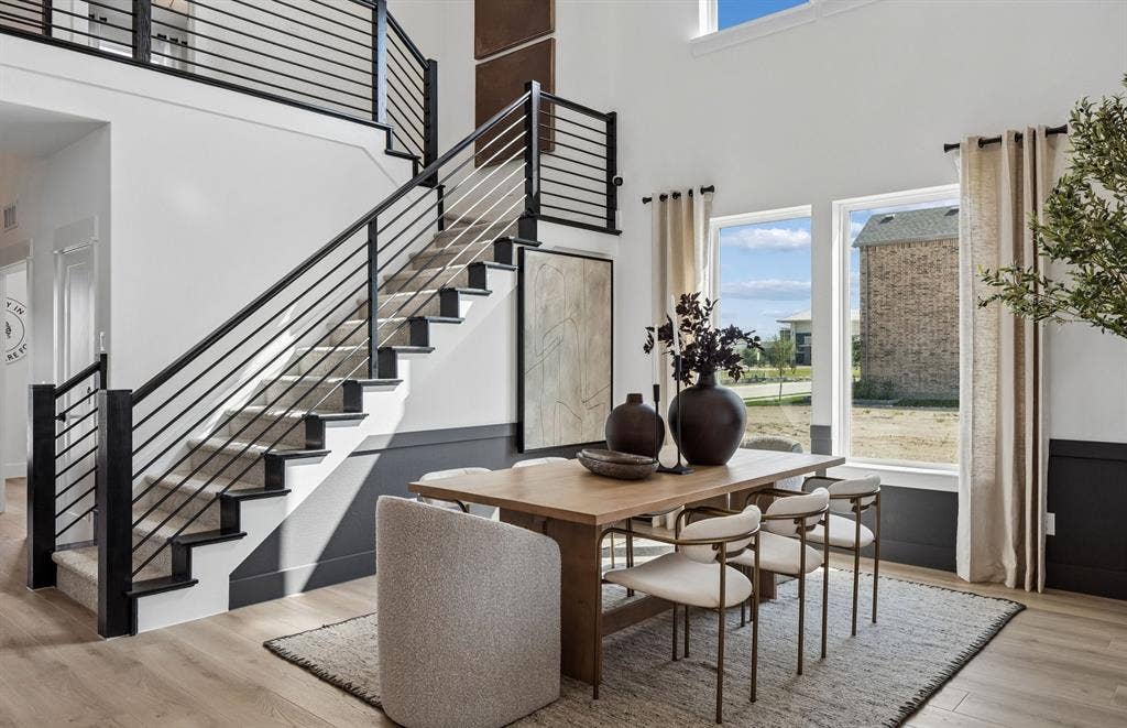 *Model Representation - Dining area off kitchen with large windows