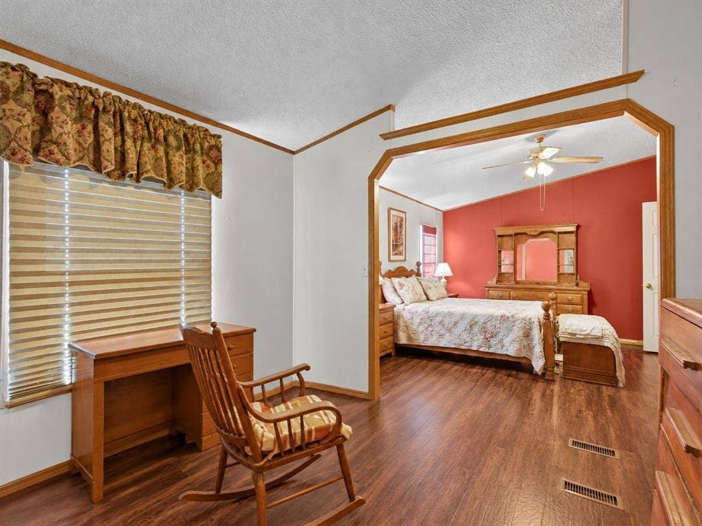 1528 CR 697, Farmersville, TX 75442 Wood-finish flooring, vaulted ceilings, and architectural pass-through with custom wood trim