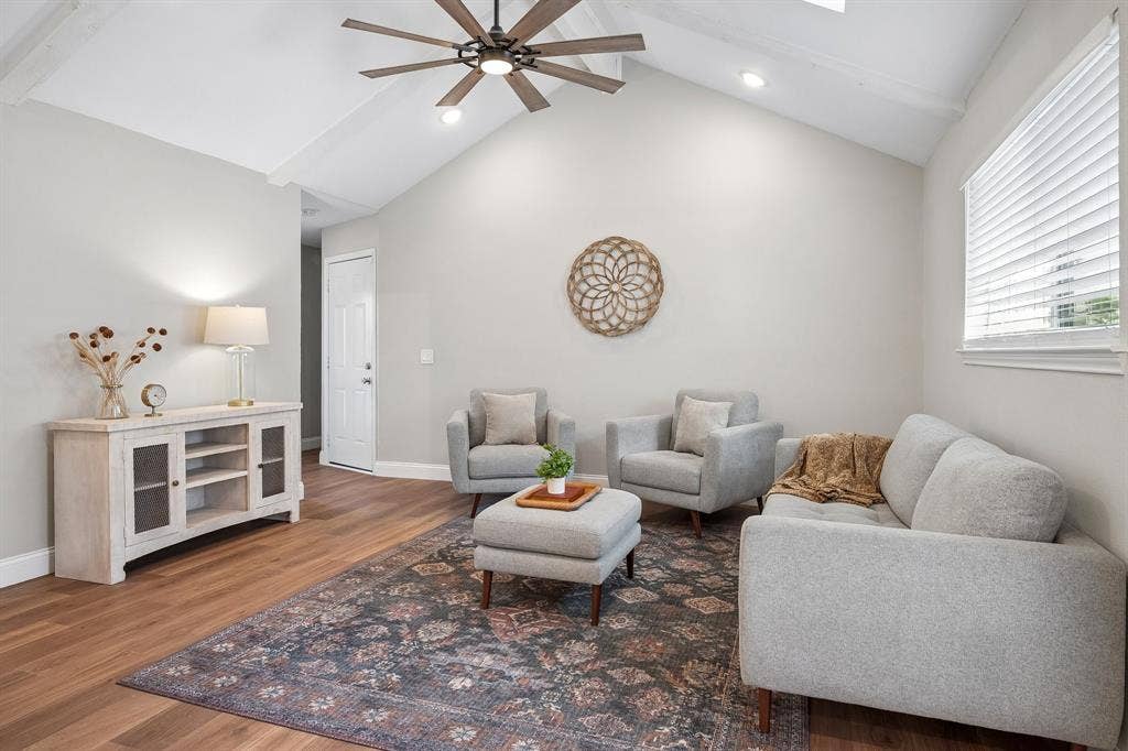 218 High Brook Drive, Richardson, TX 75080 Comfortable and bright, this second living area provides a scenic view to the backyard.