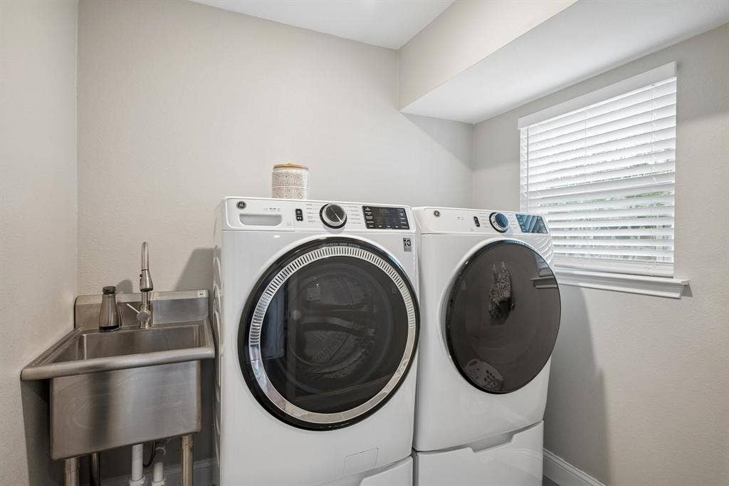 218 High Brook Drive, Richardson, TX 75080 A sink accompanies this large utility room.