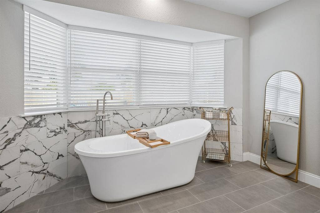 218 High Brook Drive, Richardson, TX 75080 A gorgeous garden tub centers the ensuite.
