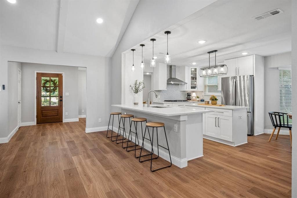 218 High Brook Drive, Richardson, TX 75080 Spanning over 3,100 sq ft, this pristinely maintained home boasts an open-concept layout.