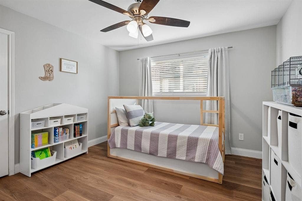 218 High Brook Drive, Richardson, TX 75080 Three additional main-level bedrooms offer great flexibility.