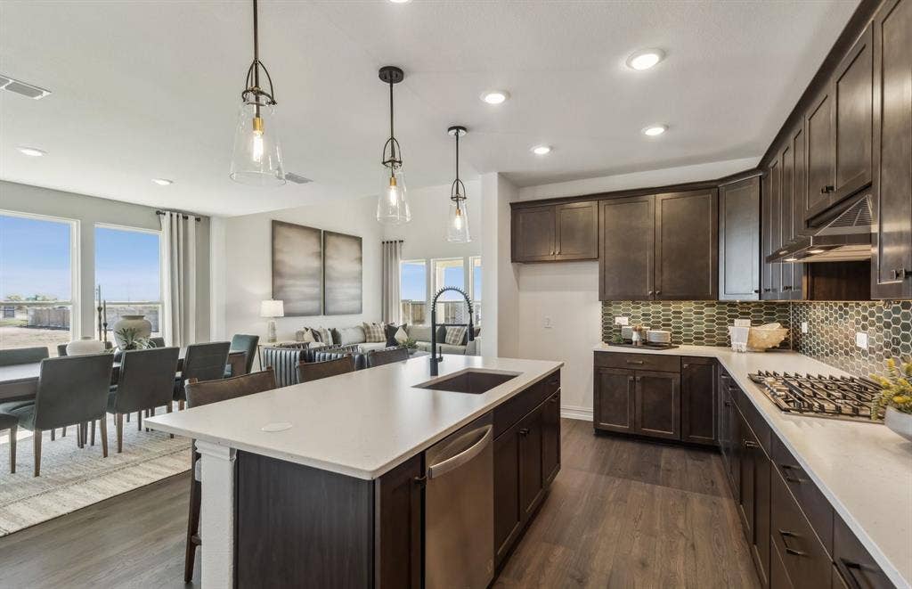 4149 Gonzales Drive, McKinney, TX 75071 *Model Representation - Large island gathering room and dining areas overlooking