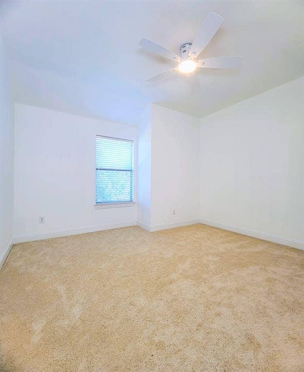 4308 Lee Hutson Drive, Sachse, TX 75048 Neutral wall finishes, plush carpeting, single-pane window with horizontal blinds, and a white ceiling fan with integrated lighting