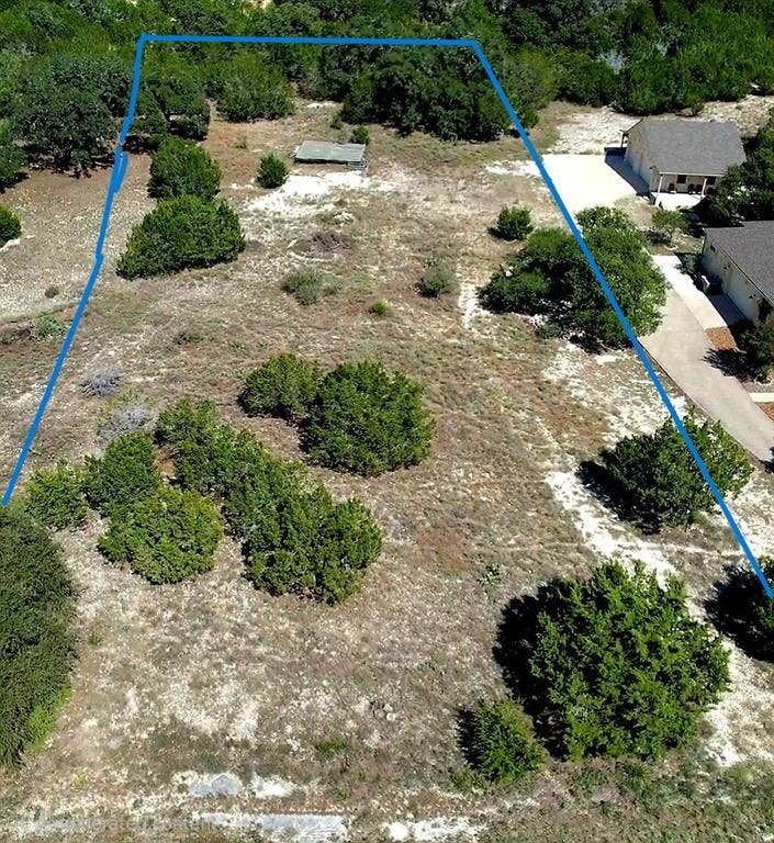570 MysticShores Boulevard, Spring Branch, TX 78070 The blue line is just to give you an idea of the property. It is not accurate.