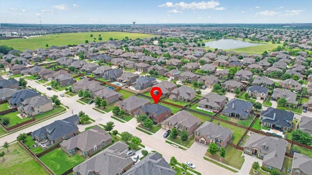 319 Westphalian Drive, Celina, TX 75009 Suburban neighborhood featuring varied architectural styles and mature landscaping
