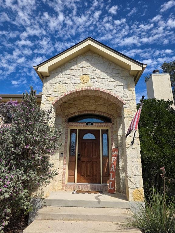 558 Mystic Shores Boulevard, Spring Branch, TX 78070 558 Mystic Shores stunning front entrance.