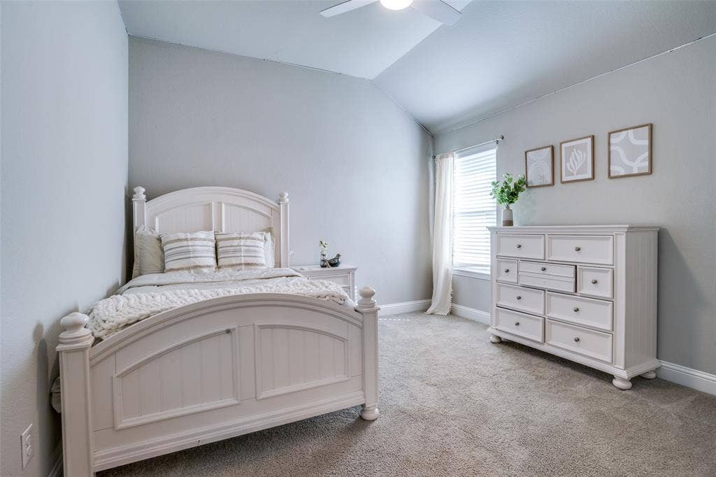 Bedroom upstairs with a full bath