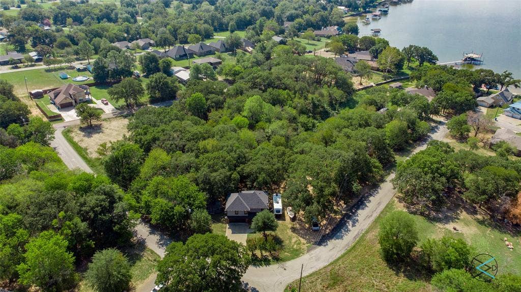 0 Bay Court, Gun Barrel City, TX 75156 Channel is behind trees. Cedar Creek Lake top right corner of photo
