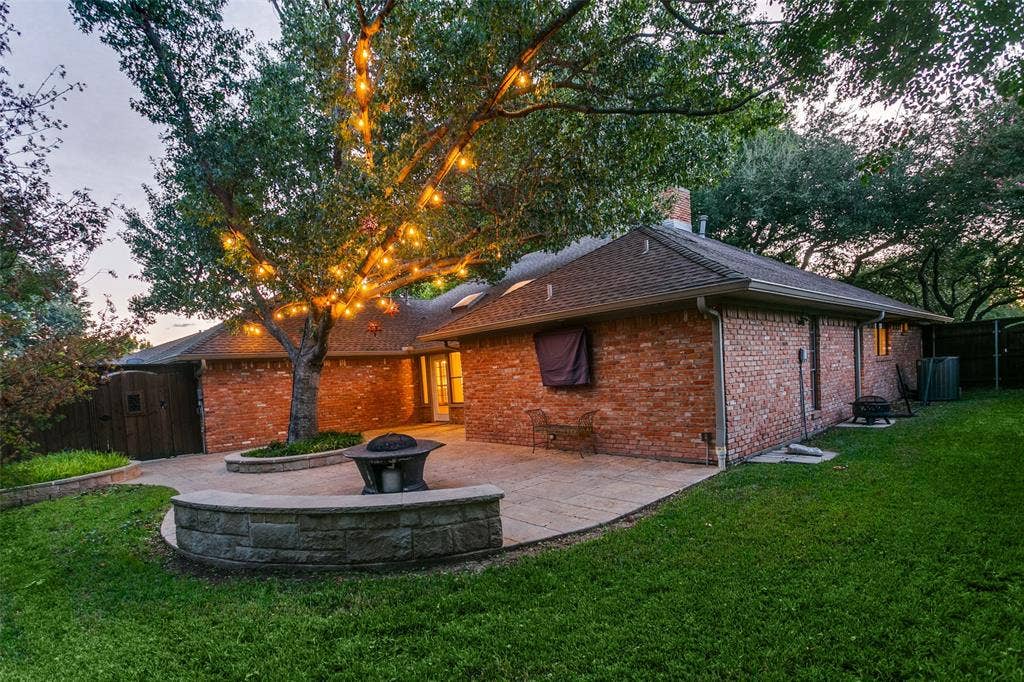 2404 Monmouth Court, Plano, TX 75075 Another view of backyard and patio and yard on right side
