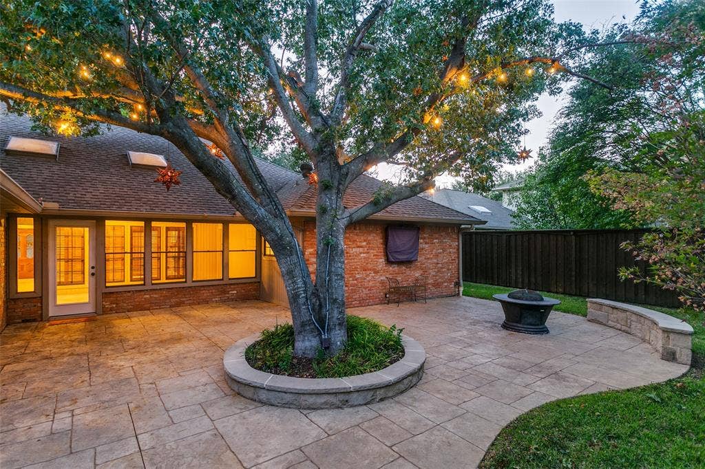 2404 Monmouth Court, Plano, TX 75075 Charming view of Back of Home with Abundance of Windows