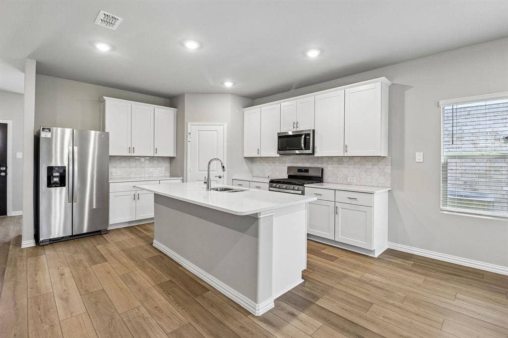 3507 Bastrop Drive, Farmersville, TX 75442 Photo is not of the actual home, but is an inspirational photo of builder’s model home and may depict options, furnishings, and/or decorator features that are not included.
