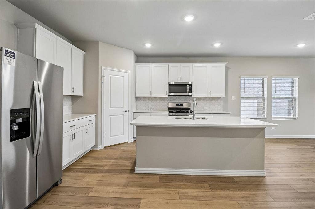 3507 Bastrop Drive, Farmersville, TX 75442 Photo is not of the actual home, but is an inspirational photo of builder’s model home and may depict options, furnishings, and/or decorator features that are not included.